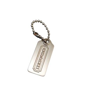 Coach Small Silver Metal Hangtag Charm Measures 1.25" X .75"